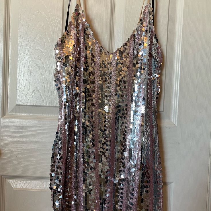 Sequin Dress, New With Tags Silver Summer Homecoming Dresses, Silver Dresses For Summer Homecoming, Silver Sequined Mini Dress For Homecoming, Silver Mini Dress For Homecoming, Silver Sleeveless Mini Dress For Homecoming, Silver Mini Length Dress For Homecoming, Spring Silver Sequin Dress With Shimmer, Silver Mini Dress For Summer Prom, Metallic Mini Dress For Spring Holiday Party