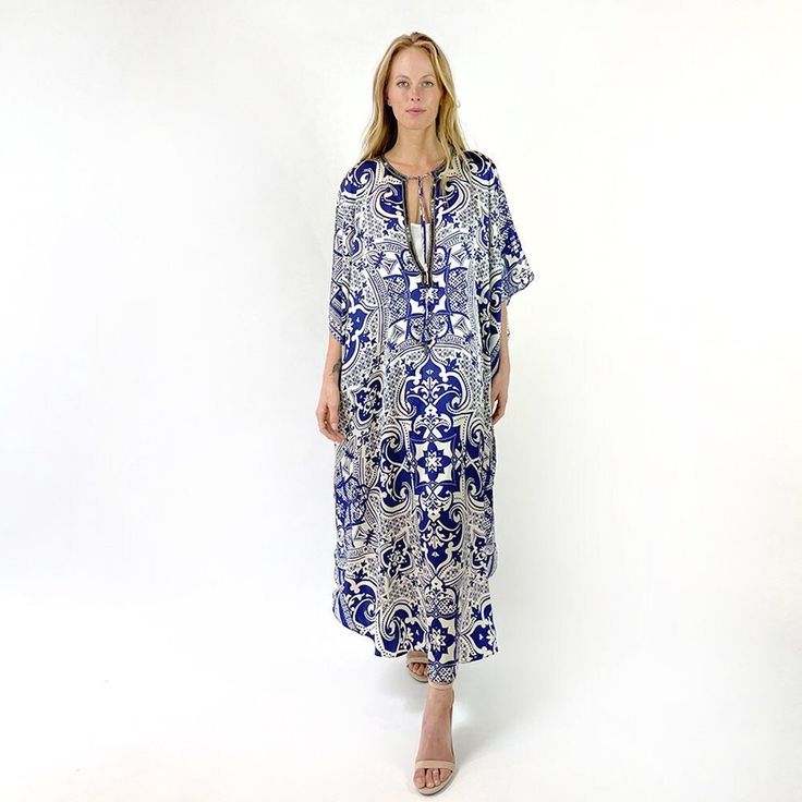 "A caftan is a perfect addition to any women's wardrobe. It can be worn day into night, as a stunning swimsuit cover-up at the beach, as well as a glamorous evening dress over a slip (sold separately in my shop), or over leggings. Made from airy silk, it is cool and airy, and great for warm weather. Hand beaded with ornate metal beads. Caftans are one size fits most, and look great on all shapes and sizes. Width is 45\" and length is 56\" from the center back neck to the center bottom edge." Silk V-neck Dress For Vacation, Elegant V-neck Kaftan For Vacation, Chic Silk Kaftan For Beach Cover-up, Chic Silk V-neck Kaftan, Bohemian Silk Beach Cover-up Dress, Elegant Beach Season Midi Dress For Vacation, Elegant Midi Dress For Beach Season Vacation, Elegant Midi Dress For Beach Vacation, Elegant Flowy Maxi Length Cover-up