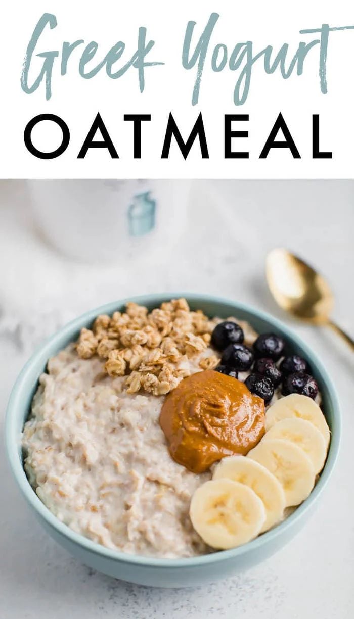 a bowl filled with oatmeal topped with bananas and blueberries