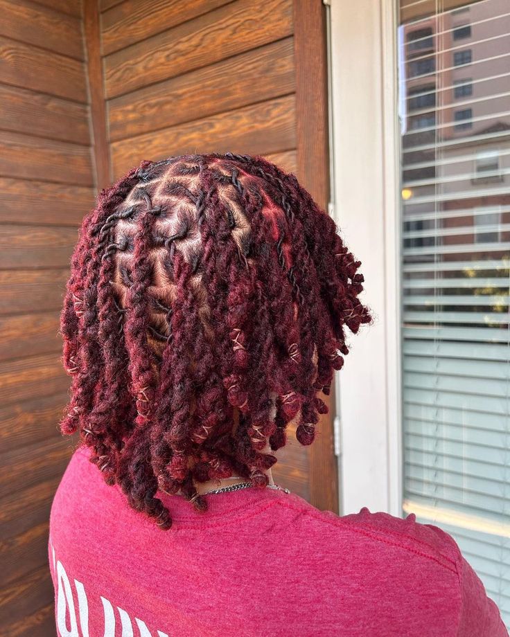 5. Short Burgundy Two Strand Twists: If you’re looking for a bold and sassy look, these short burgundy two-strand twists are a must-try! Burgundy adds a pop of color to your style, making it stand out. Just be gentle when styling to avoid frizz. Burgandy Locs On Black Women, Loc 2 Strand Twist Styles For Women, Loc Twist Styles For Women, Hoop Hairstyles, Tomboy Lifestyle, 2 Strand Twist Locs Style, Dread Colors, Loc Knots, Tapered Hairstyles