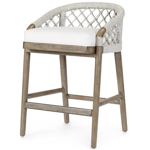 an upholstered bar stool with white cushions and wood frame, in front of a white background