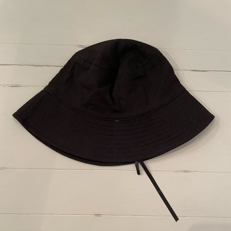 Black Bucket Hat Adjustable Tie Inside Never Worn Adjustable Black Cotton Sun Hat, Black Spring Bucket Hat, Black Cotton Sun Hat With Curved Brim, Trendy Adjustable Black Bucket Hat, Black Brimmed Cotton Sun Hat, Black Cotton Brimmed Sun Hat, Black Wide Brim Cotton Hat, Black Cotton Wide Brim Sun Hat, Black Cotton Wide Brim Hat