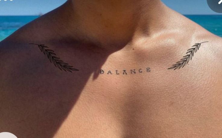 a man's chest with the word balance tattooed on his upper half and bottom part