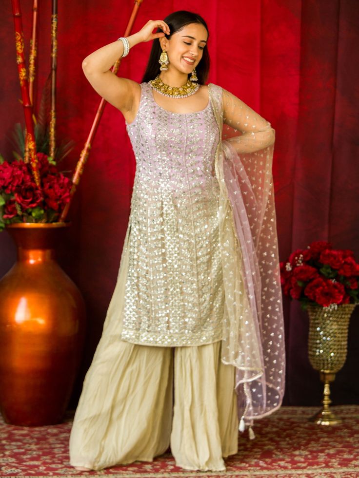 Introducing the Amisha Sharara, a truly remarkable addition to any woman's wardrobe. This stunning piece is perfect for those special occasions and events where you want to make a lasting impression. With its fusion of traditional and western elements, it effortlessly combines elegance and style. Key Features Sugar Cookie Yellow color adds a touch of vibrancy and uniqueness Designed specifically for women, ensuring a perfect fit and flattering silhouette Made with utmost attention to detail and Buy Lehenga Online, Western Elements, Indian Bridal Couture, Elegant Veils, Reception Gowns, Mehendi Outfits, Bridal Lehenga Red, Lehenga Online, Fancy Jewellery Designs