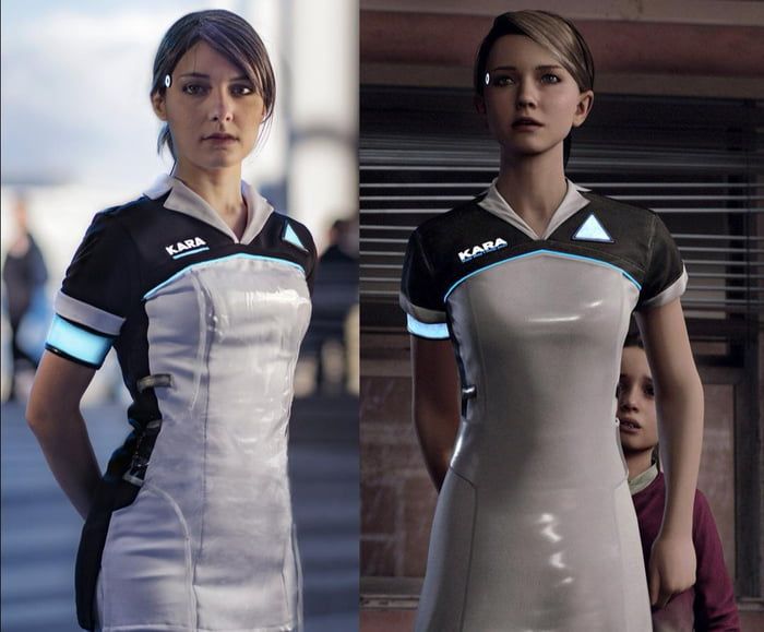 two women in futuristic clothing standing next to each other