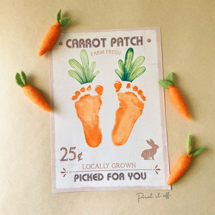 carrots are laying on top of a sign with the words carrot patch