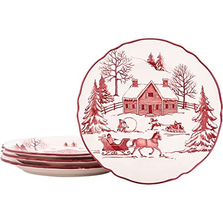 red and white christmas plates with horse drawn sleighs in front of a log cabin