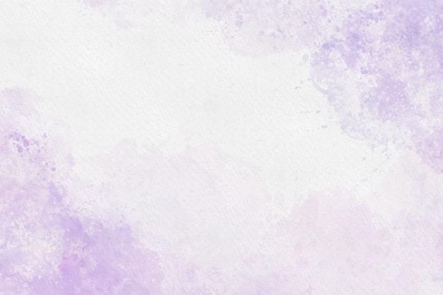 a purple and white background with watercolor stains