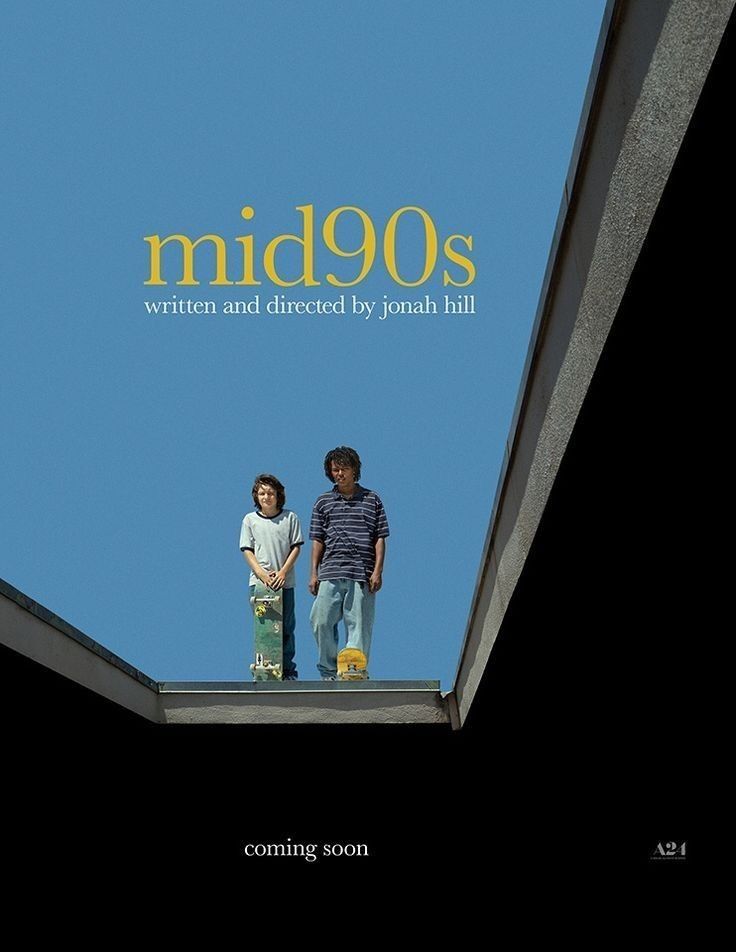 the movie mid90s is shown with two boys standing on top of a roof