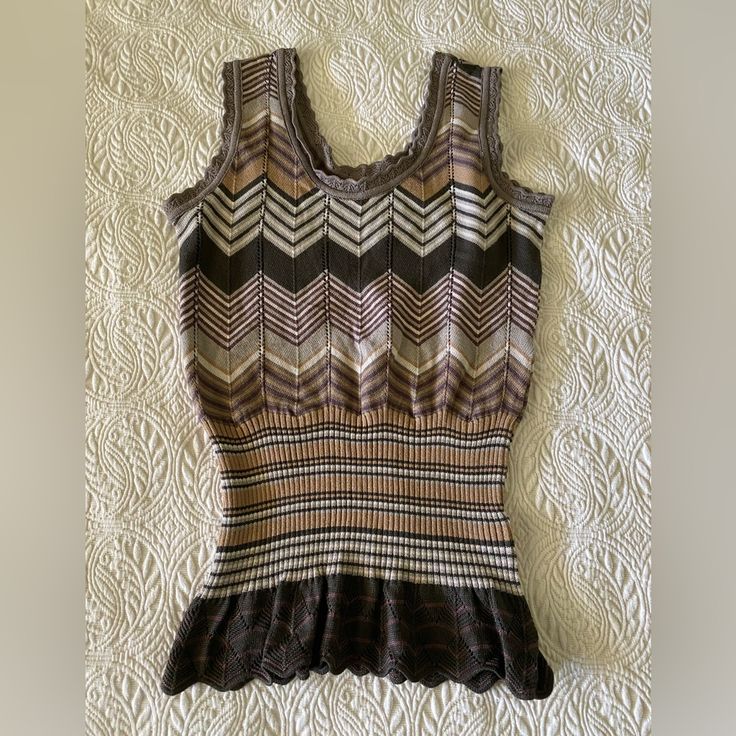 Lilja Womens Knit Crochet Vest. Size Small. Never Worn; Originally Purchased At Designer Boutique (Wright’s) In Manhattan Beach. Would Be Cute Styled With Distressed Jeans Or Cut Offs And Cowboy Boots/Suede Booties, Or Great With Tan Or Khaki Skirt For Dressy Office Style. Great With White Blouse Underneath & Jeans. Missoni Vibes. Vintage Vibes. (***Last Photo Is Styling Suggestion W/Similar Vest***) Fitted Crochet Top For Fall Layering, Fitted Brown Open Knit Tops, Brown Fitted Jacquard Knit Top, Fitted Brown Jacquard Knit Top, Fitted Crochet Knit Top For Fall, Fitted Crochet Top For Layering, Elegant Crochet Top Fitted For Layering, Brown Fitted Knitted Top, Fitted Brown Knitted Top