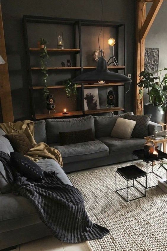 a living room filled with furniture and lots of plants on top of it's shelves