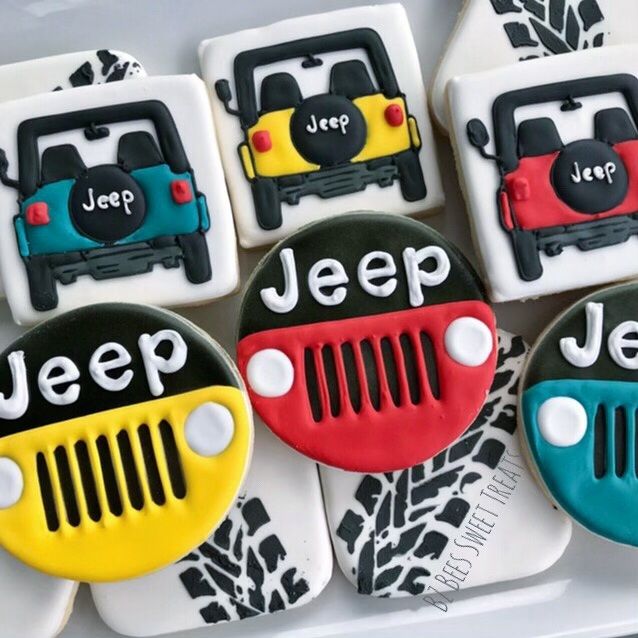 decorated cookies with jeep and jeep emblems on them