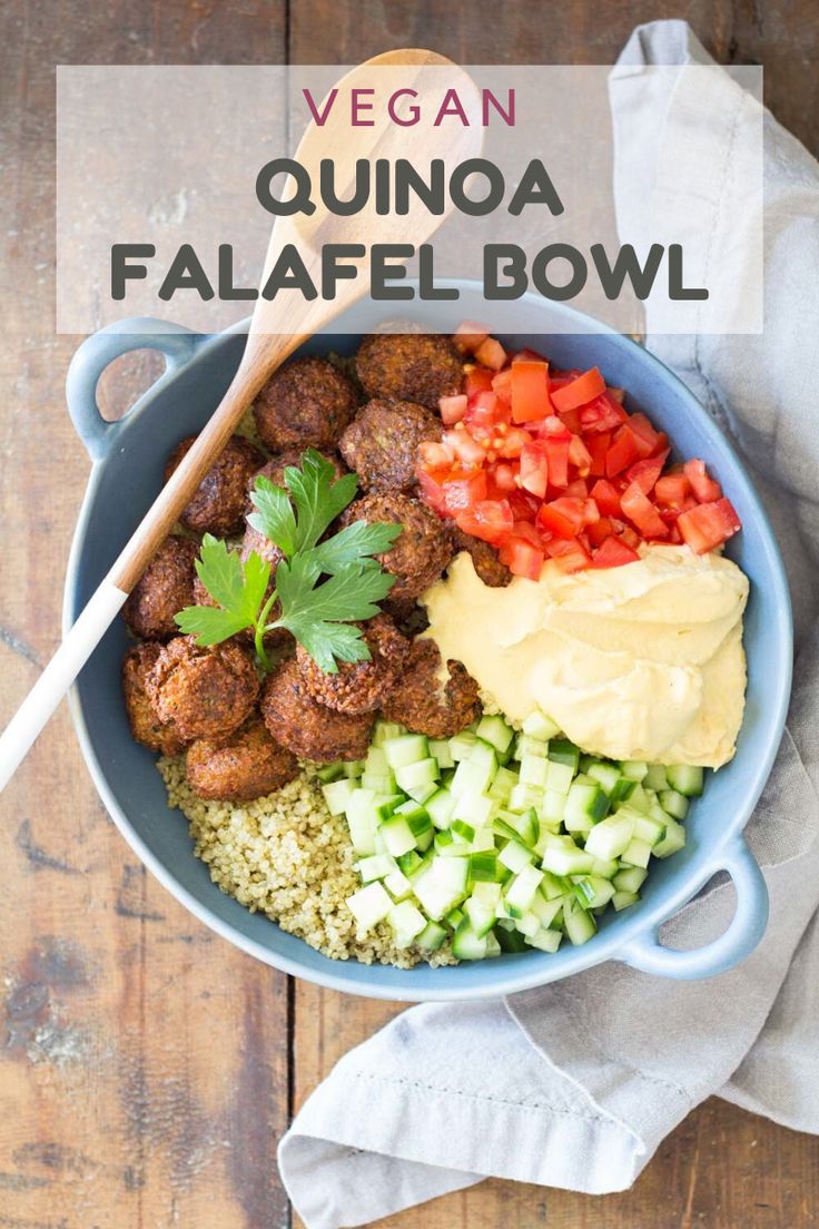 a bowl filled with meatballs, rice and veggies