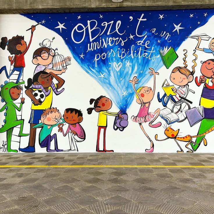 a mural painted on the side of a building with children playing and dancing in front of it