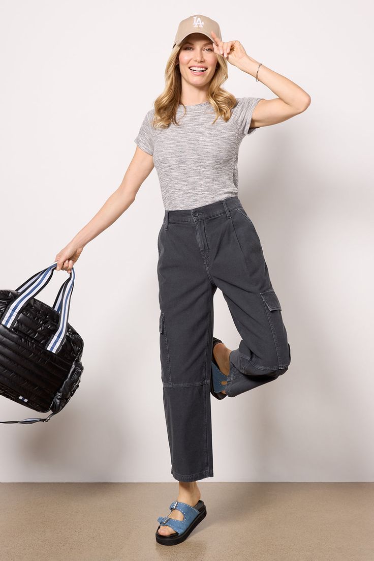 Add the Jericho Pant by AGOLDE to your utility collection. Crafted in a comfortable cotton canvas material, these pants feature a high-rise fit, four-pocket styling, pleats at the front, and cargo pockets on the outseams. Style these with your favorite graphic tee, sneakers, and baseball cap for an effortlessly chic look. | AGOLDE Women's Jericho Pants, Size 25, Black Everyday Utility Parachute Pants With Cargo Pockets, Utility Parachute Pants With Cargo Pockets For Everyday, Everyday Utility Cargo Pants With Cargo Pockets, High Waist Utility Cargo Pants For Everyday, High-waisted Cotton Cargo Jeans For Work, Everyday High Waist Utility Cargo Pants, Tapered Leg Cargo Jeans With Pockets For Everyday, Fall Cargo Pants For Everyday Use, Tapered Leg Cargo Jeans For Everyday