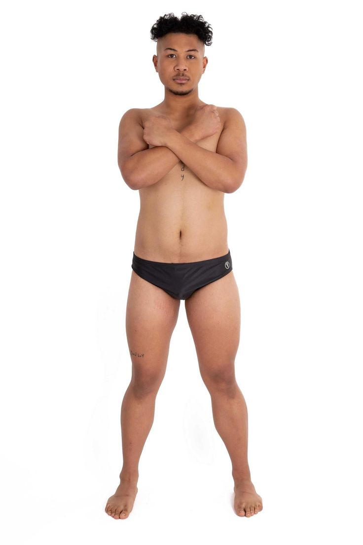 Description: Men’s Black Swim Briefs With Oversized Back Logo Durable stretch fabric with a front liner for sports comfort and a secure fit Internal adjustable drawstring Low-rise waist for a contoured look Brightly colored non-fade print Chlorine resistant 85% polyester, 15% spandex Side seam length is 6cm Model is 183cm tall and wears size Large. Acid Jazz, Body Reference Poses, Swim Brief, Compression Shorts, Wet Bar, Black Logo, Black Design, Gym Outfit, Swimming Pool