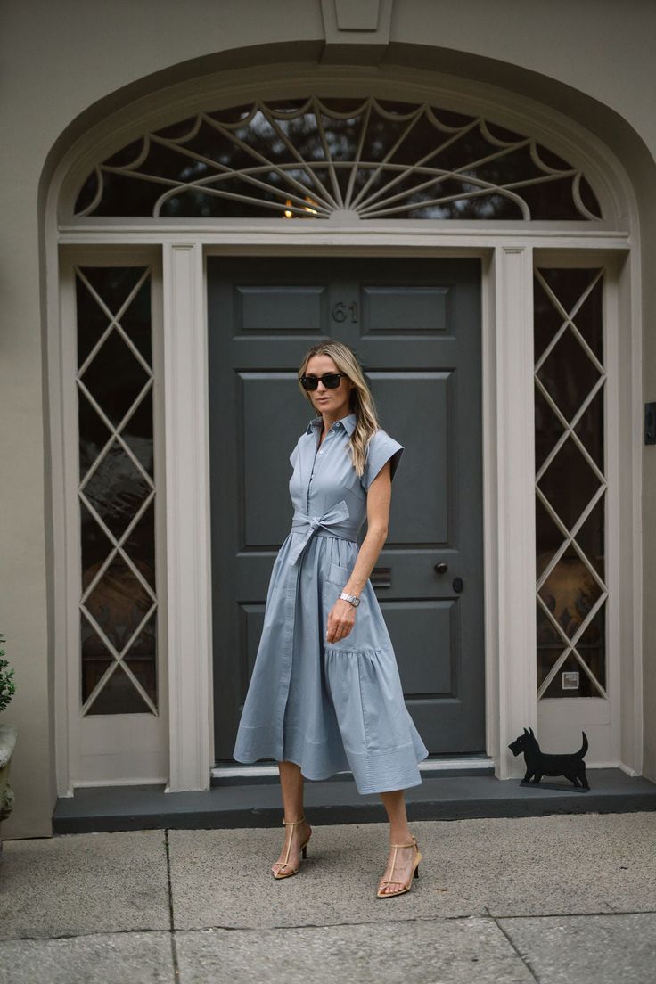 Transport yourself to 1950s Palm Beach in the perfectly vintage-inspired Betty Dress. The Betty is universally flattering silhouette (think Sisterhood of the Traveling Dress) with cap sleeves, a neck-elongating collar, cinched tie waist, and an A-line tea length. The thick oxford cotton fabrication with a hint of stretch means the Betty will hold its shape (and prevents wrinkles) through a whole day of activities. Just add a sunhat, shades, sandals and a cute tote and you're ready to hit the tow Betty Dress, Dress With Cap Sleeves, Husband Shirts, Prevent Wrinkles, Home Candles, Swim Accessories, Tea Length, Palm Beach, Sun Hats