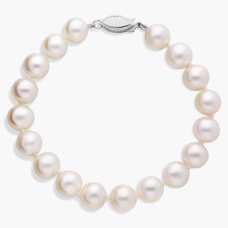 Complement her freshwater pearl strand with this matching 7" freshwater cultured pearl bracelet enhanced with a secure 14k white gold safety clasp. Formal Round Pearl Bracelet, Pearl White Round Bracelet With Pearl Drop, Pearl White Bracelet With Pearl Drop, Formal Akoya Pearl Bracelet With Pearl Charm, Akoya Pearl Drop Round Bracelets, Pearl White Round Pearl Drop Bracelet, Akoya Pearl Drop Bracelet, Formal White Gold Pearl Bracelet, Akoya Pearl Bracelet With White Gold Pearl Chain