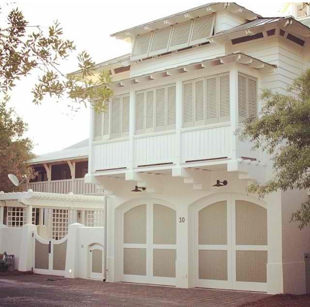 a large white house with lots of windows