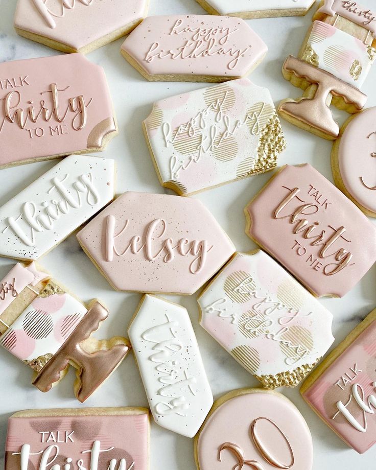 pink and gold decorated cookies with the words happy birthday to my sister on them are laid out next to each other