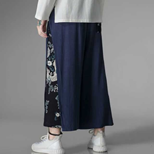 Unleash Your Inner Samurai with Our Wide Leg Japanese Pants Step into a world where tradition meets modernity with our exquisite Wide Leg Japanese Pants. These aren’t just pants—a statement, a fusion of comfort and style that transcends boundaries. Perfectly tailored for those who appreciate the fine blend of cultural heritage and contemporary fashion, these pants are your new wardrobe essential. Crafted with meticulous attention to detail, these pants feature a wide-leg design that allows for u Japanese Wide Leg Pants, Japanese Pants Hakama, Modern Kimono Dress, Indigo Cotton Wide-leg Pants, Dark Blue Kimono Traditional, Japanese Pants, Blue Japanese Kimono, Japanese Uniform, Sukajan Jacket