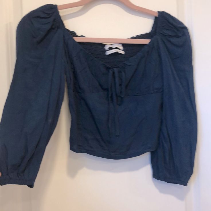 Urban Outfitters Lightweight Cropped Blouse In Navy Blue. Cute Peasant Looking Too With Elastic Winched Arms And An Elastic Back. Never Been Worn! Casual Peasant Top With Blouson Sleeves For Brunch, Casual Tops With Blouson Sleeves For Brunch, Casual Blouson Sleeve Top For Brunch, Casual Tops With Blouson Sleeves For Day Out, Blue Cotton Blouse With Blouson Sleeves, Spring Blue Blouse With Blouson Sleeves, Blue Fitted Puff Sleeve Top For Fall, Chic Urban Outfitters Cotton Tops, Blue Tops With Blouson Sleeves For Brunch