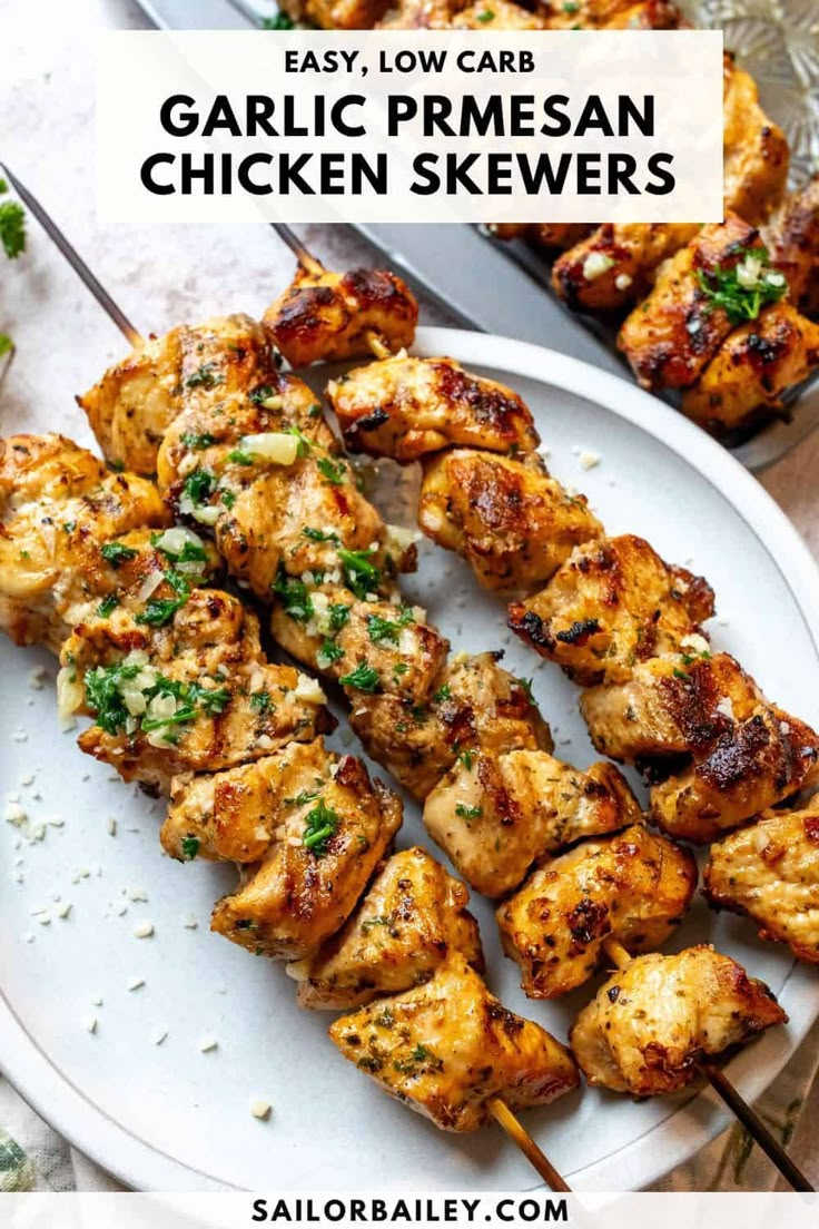 grilled chicken skewers on a white plate with text overlay