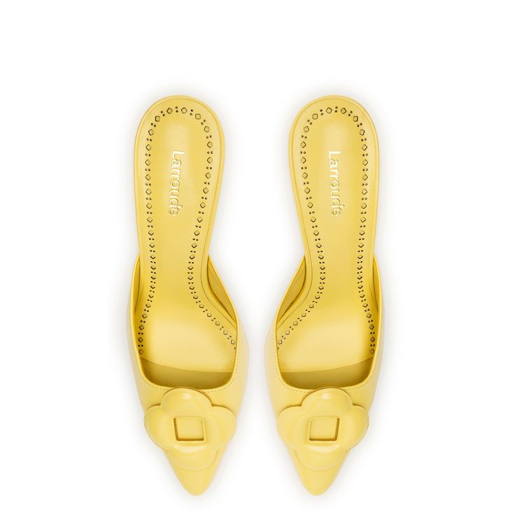 An indispensible part of our everyday uniform right now, this kitten heel silhouette is equal parts sleek and chic in a new yellow-toned colorway. Designed to be ladylike with thoughtful details, we love dressing them down with denim and pairing them with a menswear-inspired suit for the kind of cool contrast we love. Product Details: Lemonade Soft glow leather 2.5 inch stiletto heel Finely crafted leather sole for support, durability, and comfort Insole with memory foam cushion and hot stamp lo Hot Stamp, Everyday Uniform, Bridal Pumps, Elegante Y Chic, Denim Hat, Scarf Sale, Jennifer Fisher, Yellow Tones, Swim Shop