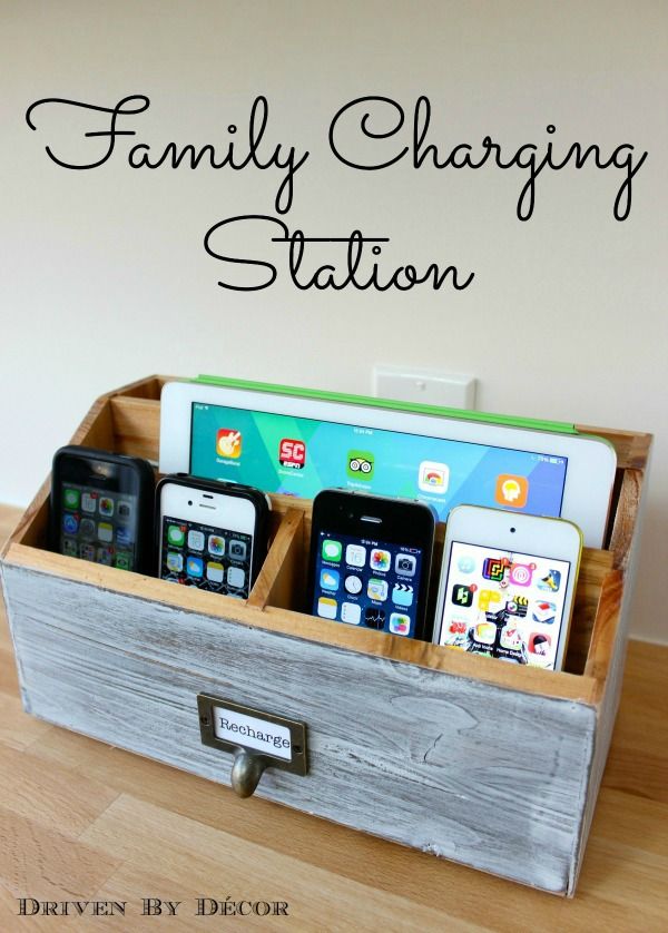 the family charging station is made out of an old wooden box