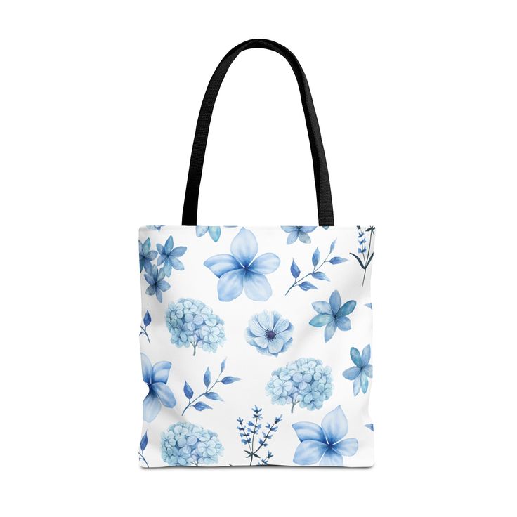 This versatile tote bag is perfect for any occasion - whether you're heading to school, the beach, or the grocery store. Its book bag design makes it easy to carry, while the beautiful blue flowers add a touch of style. Stay eco-friendly with this reusable bag that can be used time and time again. Available in 3 sizes to add both functionality and style, these tote bags come with multiple handle colors to match your designs. Made with spun polyester, these bags feature double-stitched seams, cot Light Blue School Bag For Summer, Blue Shoulder Bag For School In Spring, Light Blue School Bags For Spring, Blue Summer Bags Perfect As Gifts, Blue Beach Bag For Everyday Use In Spring, Blue Large Capacity Beach Bag For Spring, Blue Everyday Beach Bag For Spring, Blue Rectangular Beach Bag For Spring, Blue Beach Bag For Everyday Spring Use