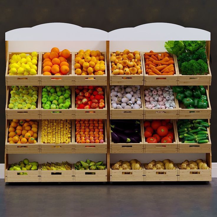 an assortment of fruits and vegetables displayed in wooden crates