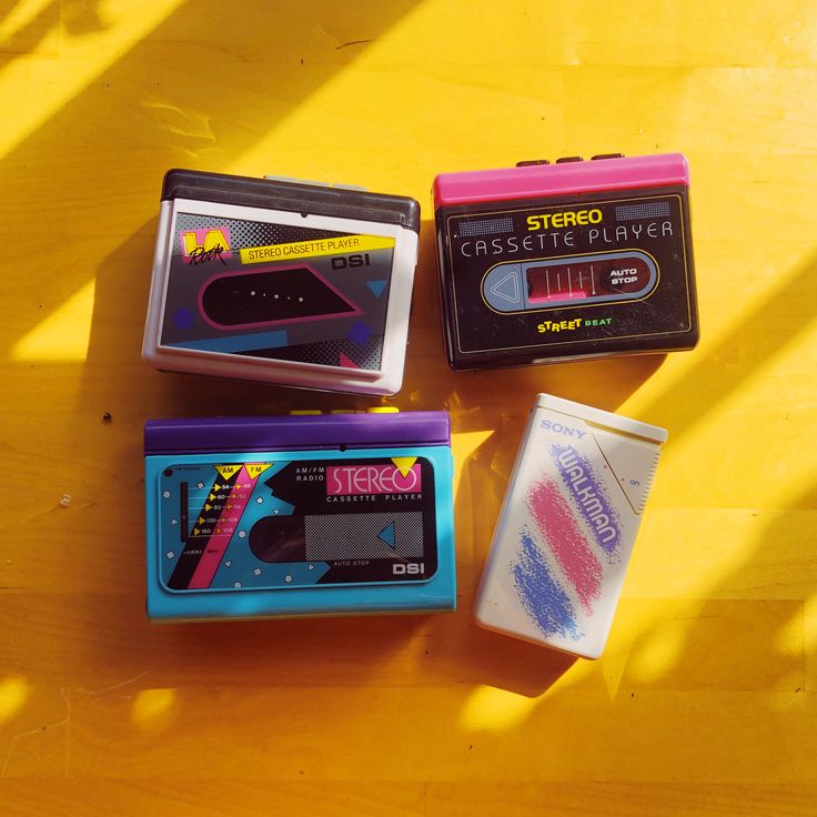 three different types of cassette players on a table