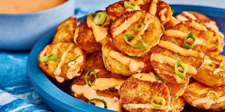 some fried food is in a blue bowl