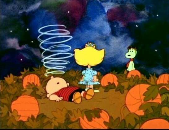 the peanuts movie is shown with pumpkins in the foreground and an animated character on the