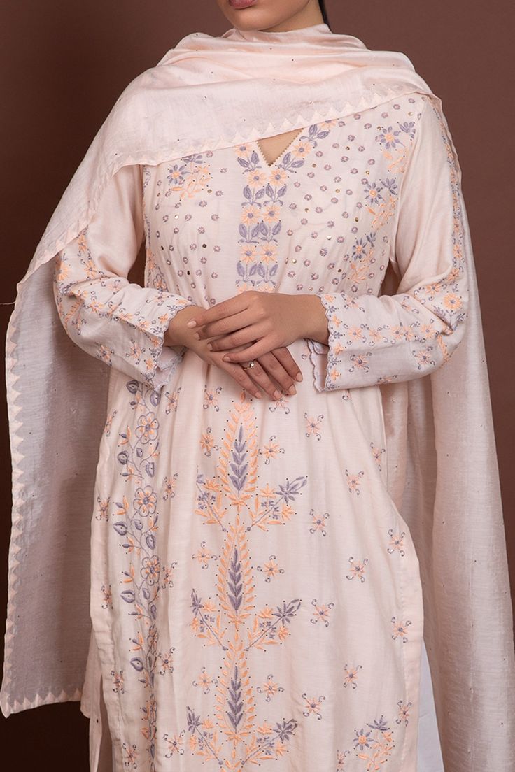 Light beige kurta with all-over chikankari embroidery and v-neck. Paired with straight pants and dupatta.
Component: 3
Embroidered
Neckline: V-Neck
Sleeve Length: Full
Fabric: Cotton Silk Mulmul
Color: White
Chikankari and jaal embroidery
Embroidered border on pants - Aza Fashions Traditional V-neck Semi-stitched Salwar Kameez, Traditional V-neck Sharara For Eid, Embroidered V-neck Traditional Wear For Festivals, V-neck Cotton Kurta With Resham Embroidery, Embroidered Anarkali Set With V-neck, Embroidered V-neck Kurta For Eid, Traditional V-neck Anarkali Set With Dupatta, Embroidered V-neck Anarkali Set, Traditional V-neck Sets With Resham Embroidery