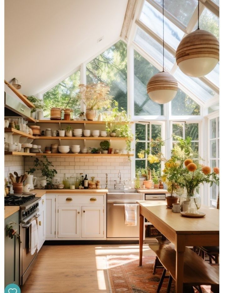 a kitchen filled with lots of counter top space next to a dining room table and chairs