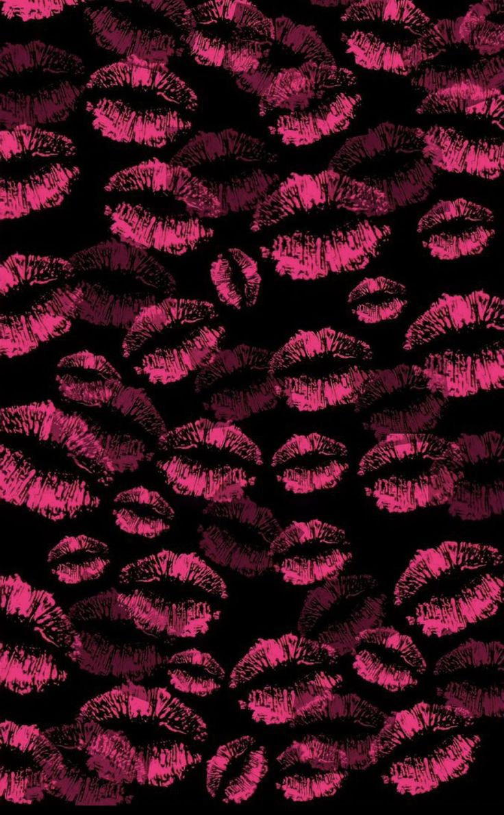 pink lipstick kisses on black background