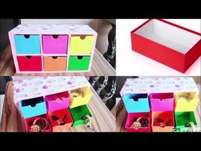 three different colored boxes with lids and drawers