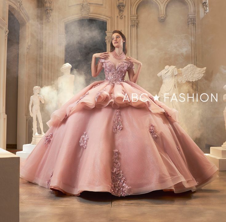 Look like a fairytale princess in this embroidered floral applique off the shoulder ball gown with A-line layered skirt by Ragazza Fashion EV60-660. This beautiful long off the shoulder corset dress features a sweetheart bodice adorned with floral appliques, open lace-up back, and a floor length A-line skirt with a sweep train. Off Shoulder Quinceanera Dress by Ragazza EV60-660 Designer: Swan Collection by Ragazza Fashion 2024 Style Number: EV60-660 Colors: Blush Pink Sizes: 3, 5, 7, 9, 11, 13, 16th Dresses, Off The Shoulder Corset Dress, 1500 Dresses, Xv Ideas, Beautiful Ball Gowns, Fairytale Princess, Military Ball Dresses, Champagne Dress, Quinceanera Dress