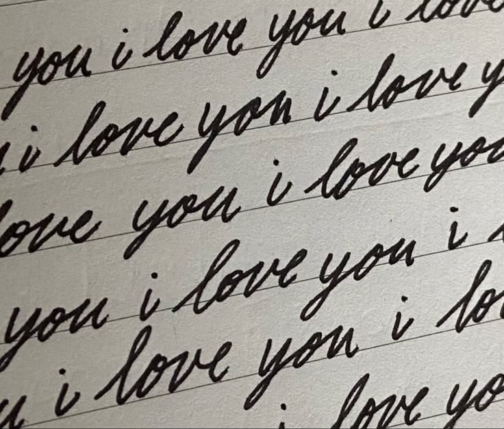 an old handwriting written in black ink on white paper with the words i love you