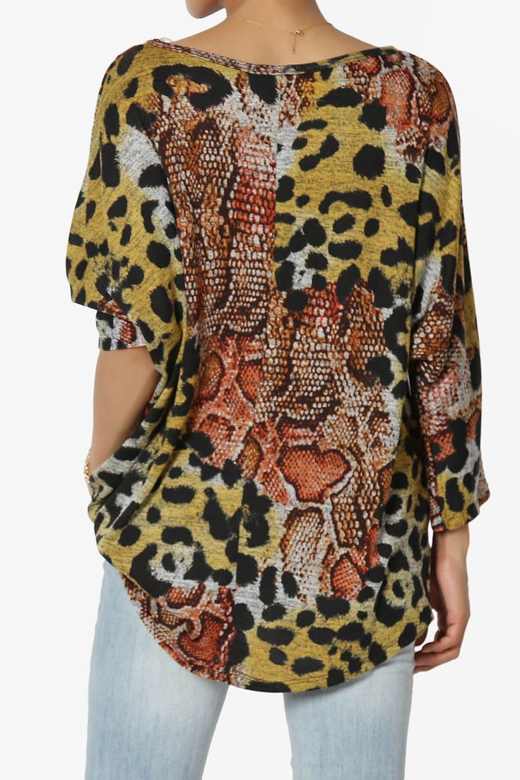 Printed Dolman Sleeve Pullover Top – Effortlessly stylish, this lightweight, stretch Hacci knit top features chic leopard, floral, polka dot, and chevron prints. With a relaxed fit, hi-low hem, and boat neck, it’s perfect for casual wear, office days, or travel. Wear with skirts or tailored pants or denim for versatile, everyday style. Lightweight Draped Knit Top – Featuring trendy leopard, floral, chevron and polka dot prints for casual or travel looks. Comfortable 3/4 Sleeve Pullover – Perfect Oversized All Over Print Tops For Spring, Oversized Spring Tops With All Over Print, Oversized Tops With All Over Print For Spring, Spring Leopard Print Relaxed Fit Top, Leopard Print Tops For Spring, Leopard Print Blouse For Fall, Leopard Print Relaxed Fit Top For Spring, Stretch Leopard Print Blouse For Fall, Fall Leopard Print Stretch Blouse