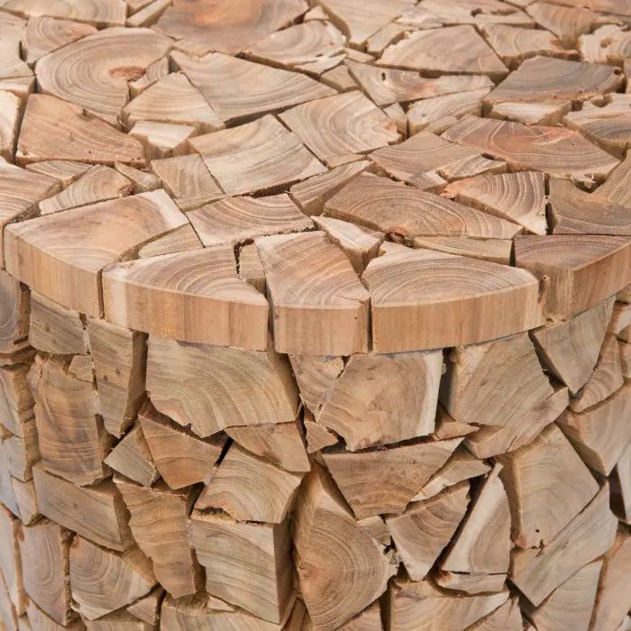 a wooden table with many pieces of wood stacked together