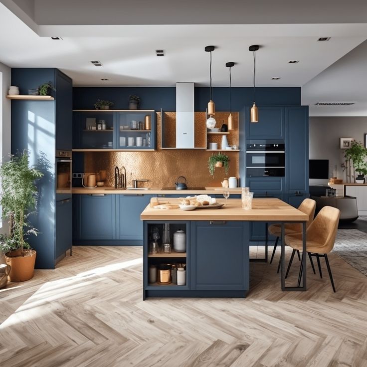 a large kitchen with blue cabinets and wooden flooring, along with an island in the middle