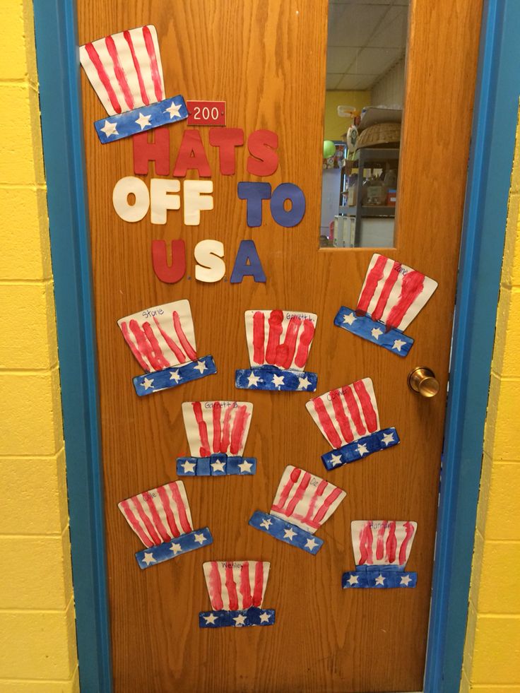 a door decorated with american flags and the words hats off to usa