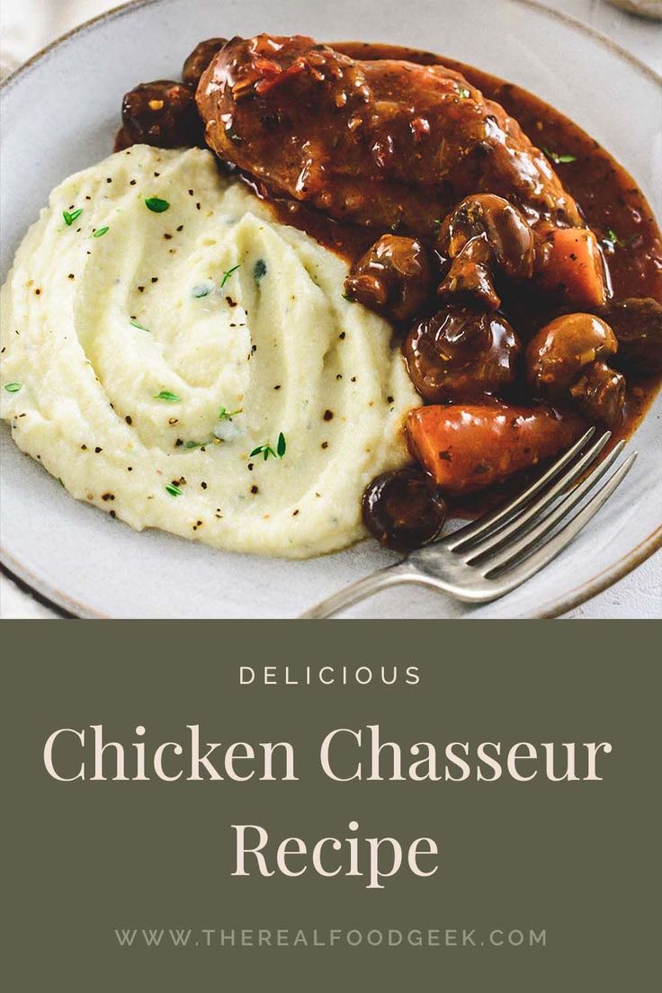 a plate with mashed potatoes, meat and gravy next to a fork