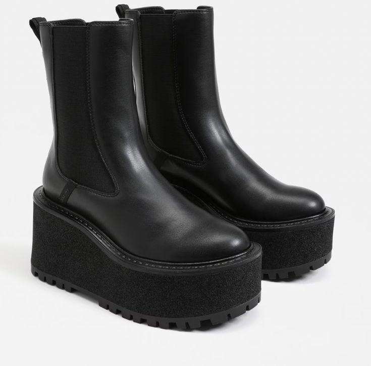 *THIS ITEM IS FINAL SALE* Color: Black Material: Vegan Leather A little rugged and cut out for blazing city streets, Susan's Chelsea boot styling and XL lug sole means business. Just add your favorite trousers or jeans and hit the sidewalk full strut ahead. Heel Height: 3.8 inchesPlatform Height: 2.5 inchesToe Type: Rounded ToeBoot Shaft: 4.5 inchesCalf Circumference: 10.2 inchesMaterial: SyntheticInsole: Synthetic Width: Medium Runs true to size FINAL SALE Susan Black, Sneaker Heels Wedges, Black Platform Boots, Swimwear Sets, Rounded Toe Boots, Top Pants Set, Strapless Tops, Black Platform, Chelsea Boot