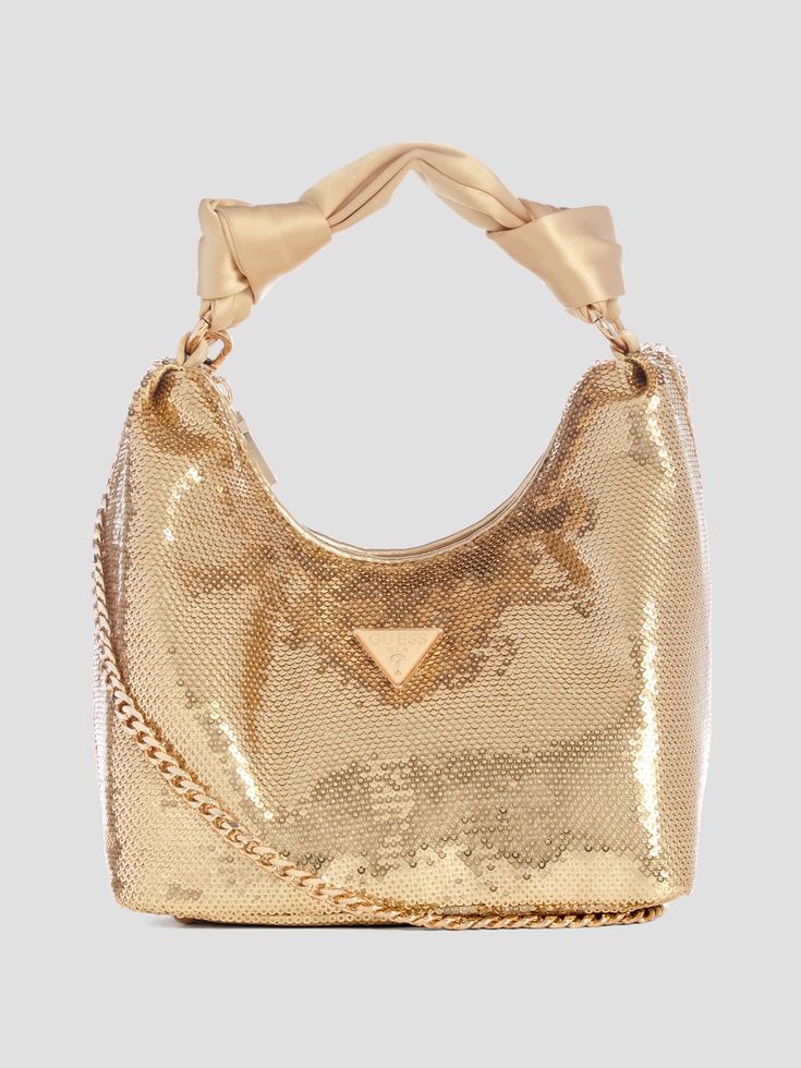 Sequin hobo bag Allover sequins Shiny gold-tone hardware Front signature triangle plaque Organized and lined interior Zip-top closure Satin top handle with 6" drop. Detachable chain strap with 18.75" drop. 8.25"W x 7.5"H x 4.75"D Bag Guess, Satin Top, Sequin Top, Online Bags, Lifestyle Brand, Pink Bag, Hobo Bag, Lifestyle Brands, Chain Strap