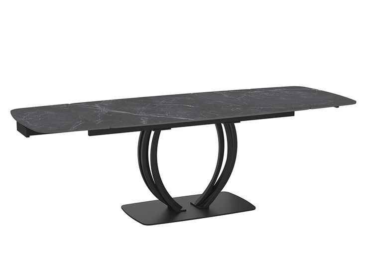 a black marble dining table with an oval base