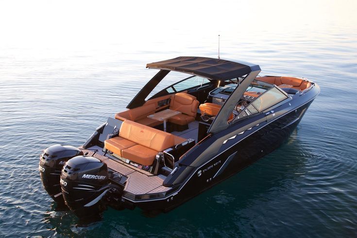 a motor boat with two seats in the water