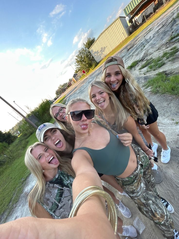 a group of women taking a selfie together